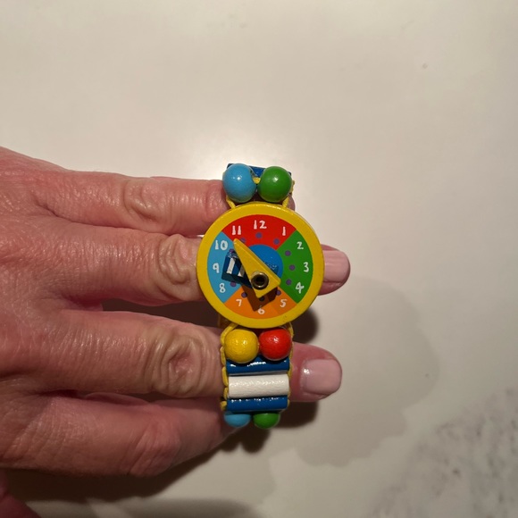 Elastic wooden tatiri watch for kids.  Helps teach kids how to read time. - Picture 3 of 8